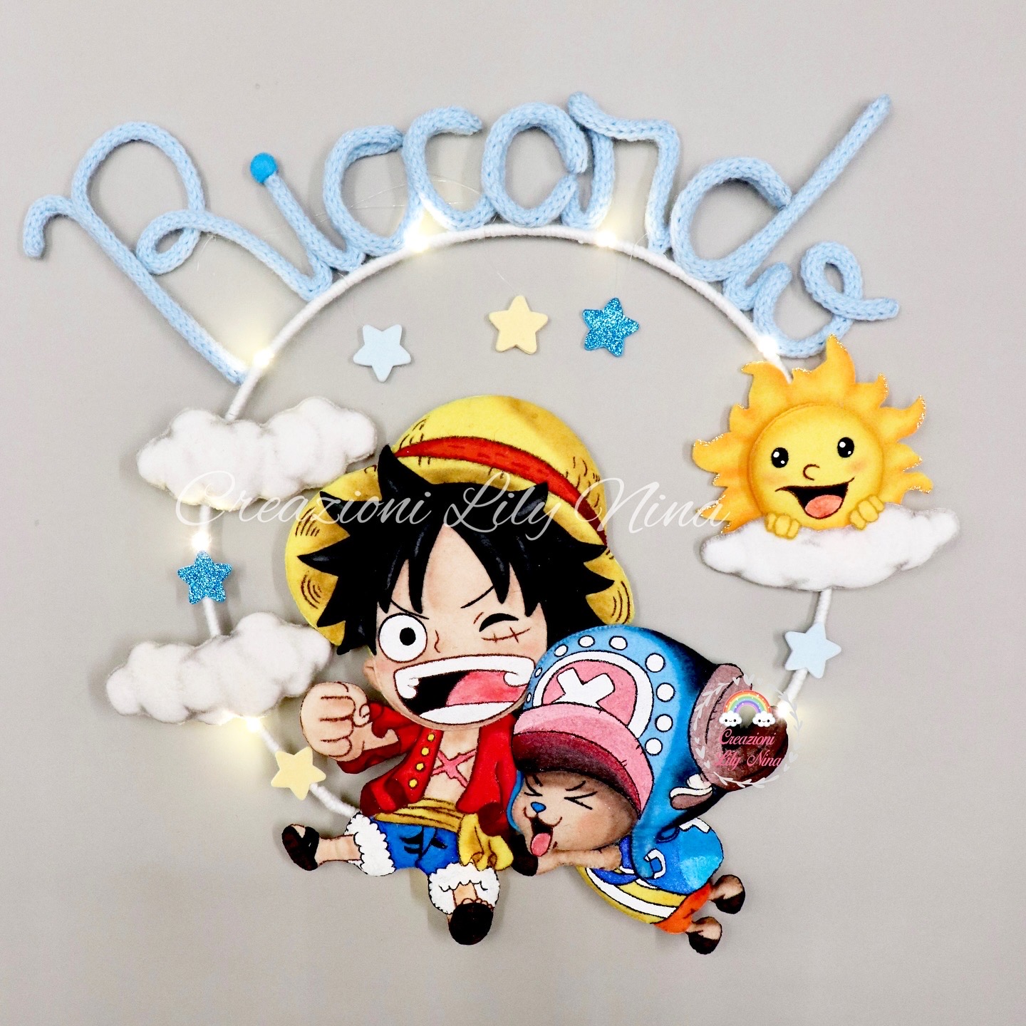 Fiocco nascita One Piece con Rufy e Chopper nome Riccardo in tricotin 