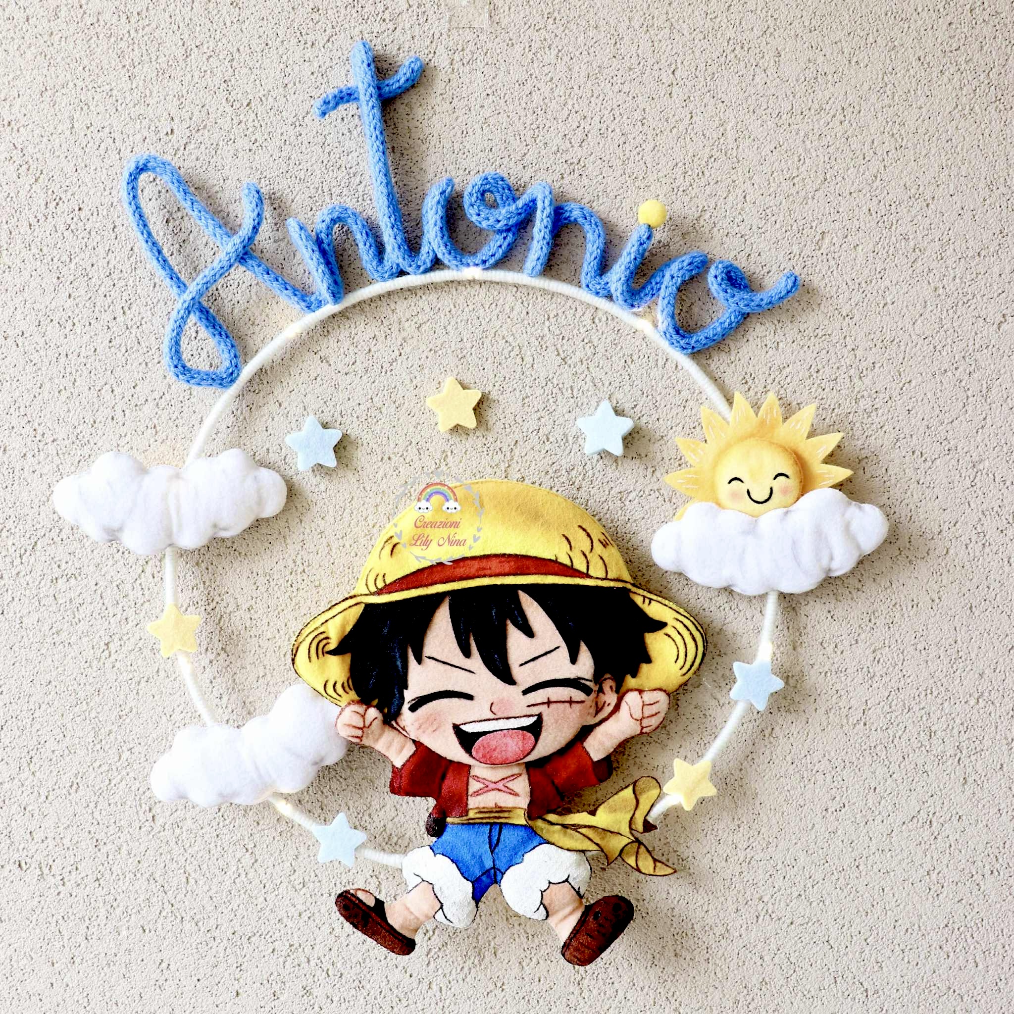 Fiocco nascita Rufy one piece con nome Antonio in Tricotin 