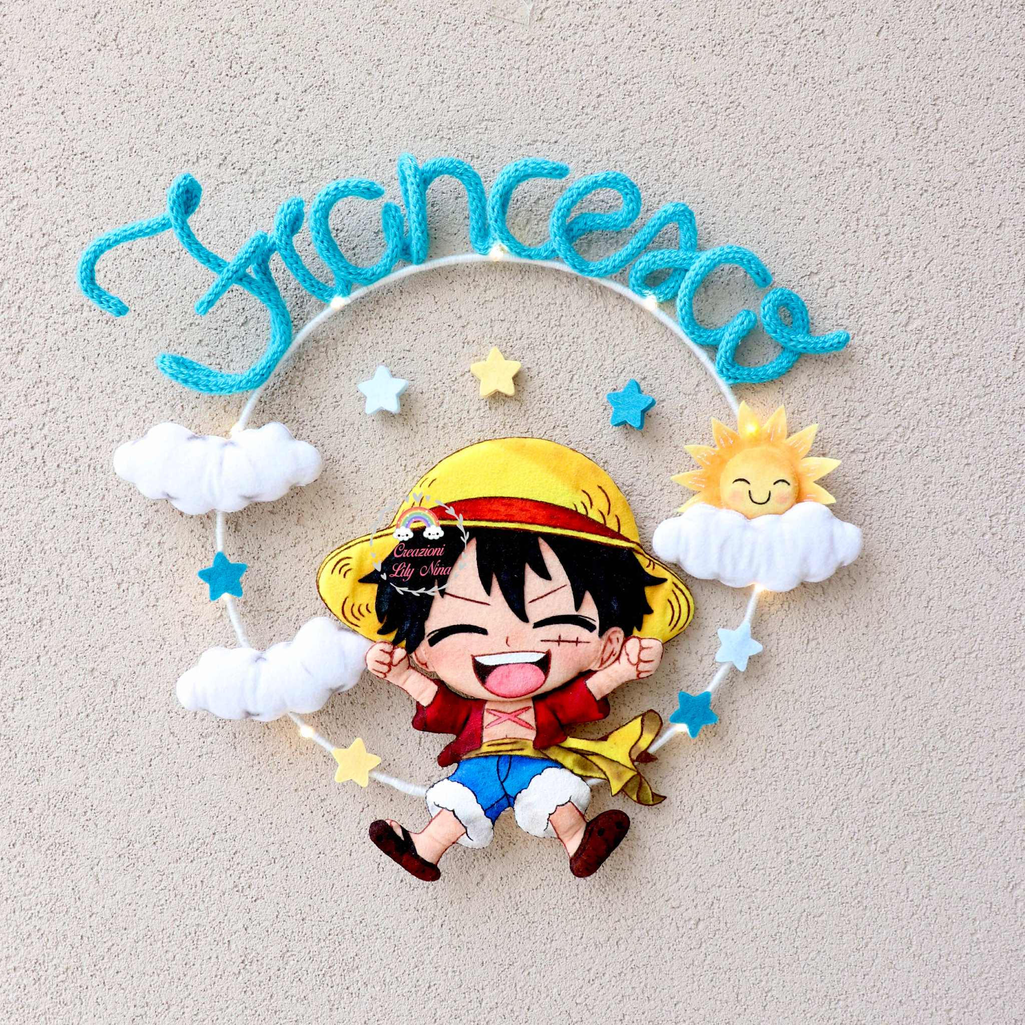 Fiocco nascita One Piece Rufy con nome Francesco in tricotin  