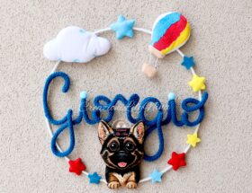 Fiocco nascita con il cucciolo di cane con nome Giorgio in tricotin