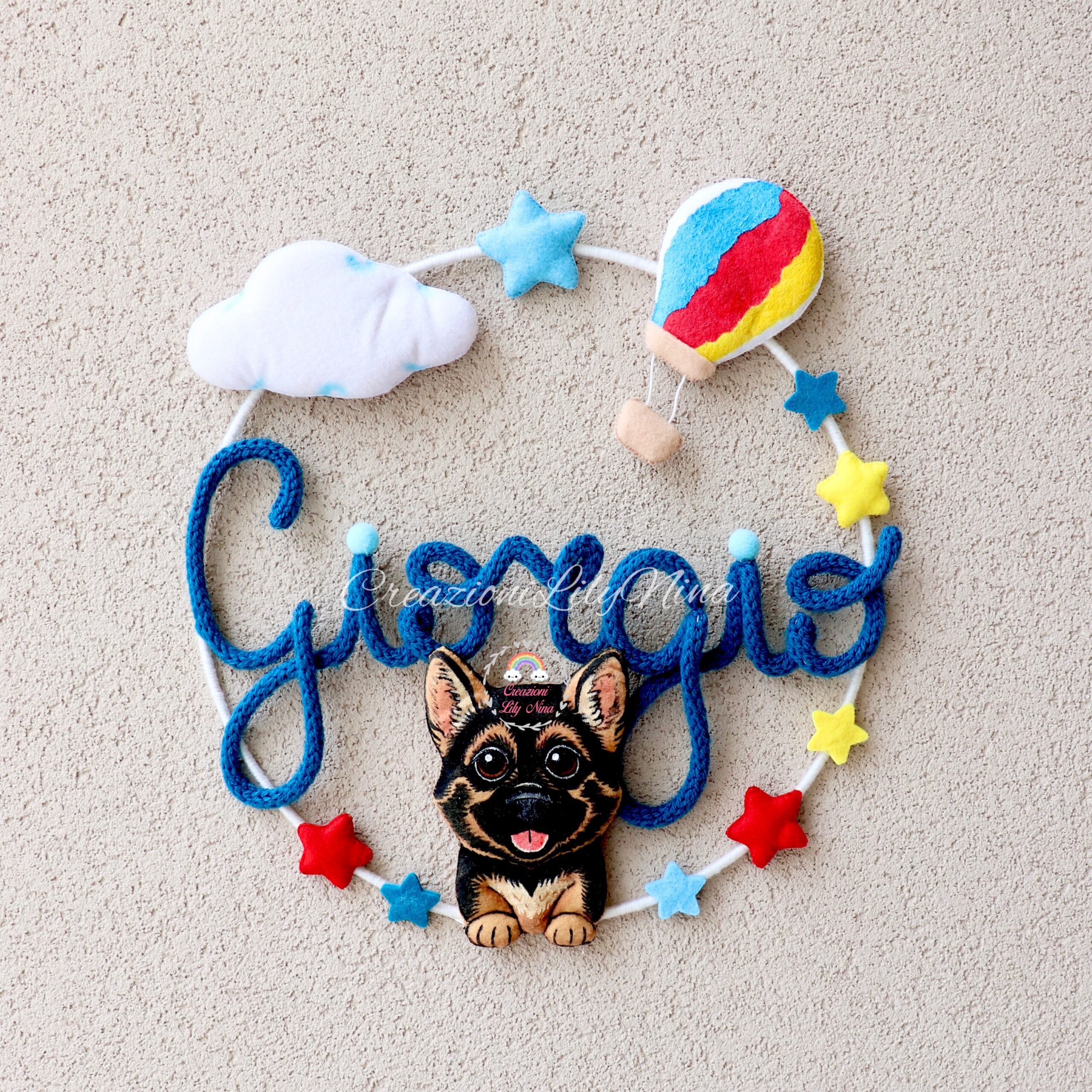 Fiocco nascita con il cucciolo di cane con nome Giorgio in tricotin 